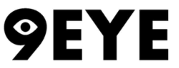 9EYE - logo Overhead portrait of a musician lying in darkness beside a small keyboard, surrounded by glowing colorful orb lights in red, teal, and yellow.